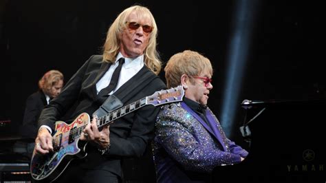 Can Elton John Read Music? And Does His Musical Prowess Stem Solely from This Ability?